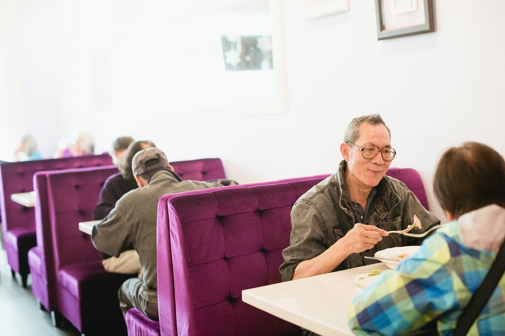 Outer Sunset resident David Lok eating lunch off the CHAMPSS Menu at Prince Cooking. Photo by Andria Lo.